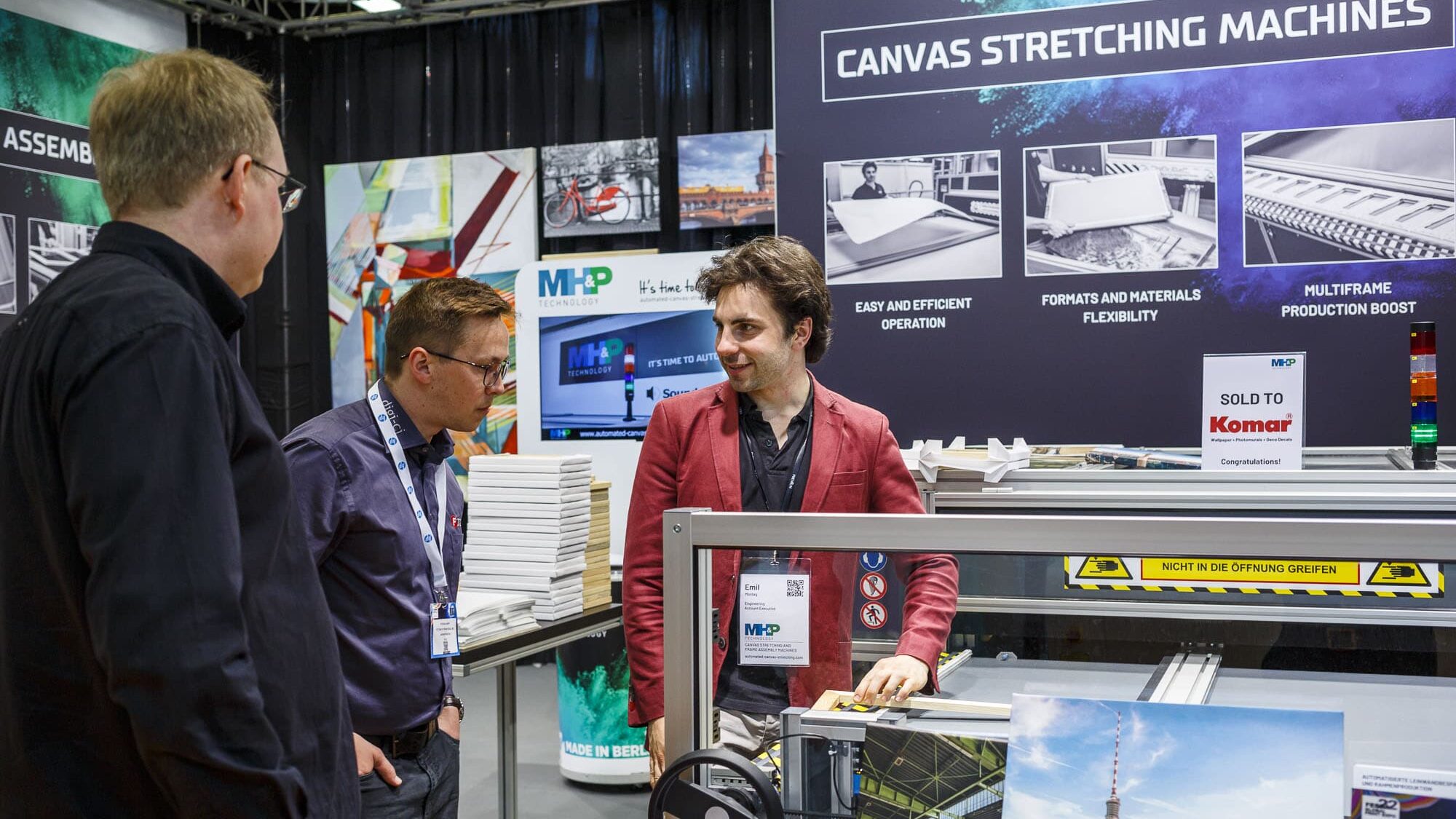 Demonstrations with the MHP Canvas Stretching Machine STMaster at Fespa 2022.